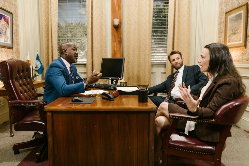 Lawyers in a professional office discussing a tax dispute case